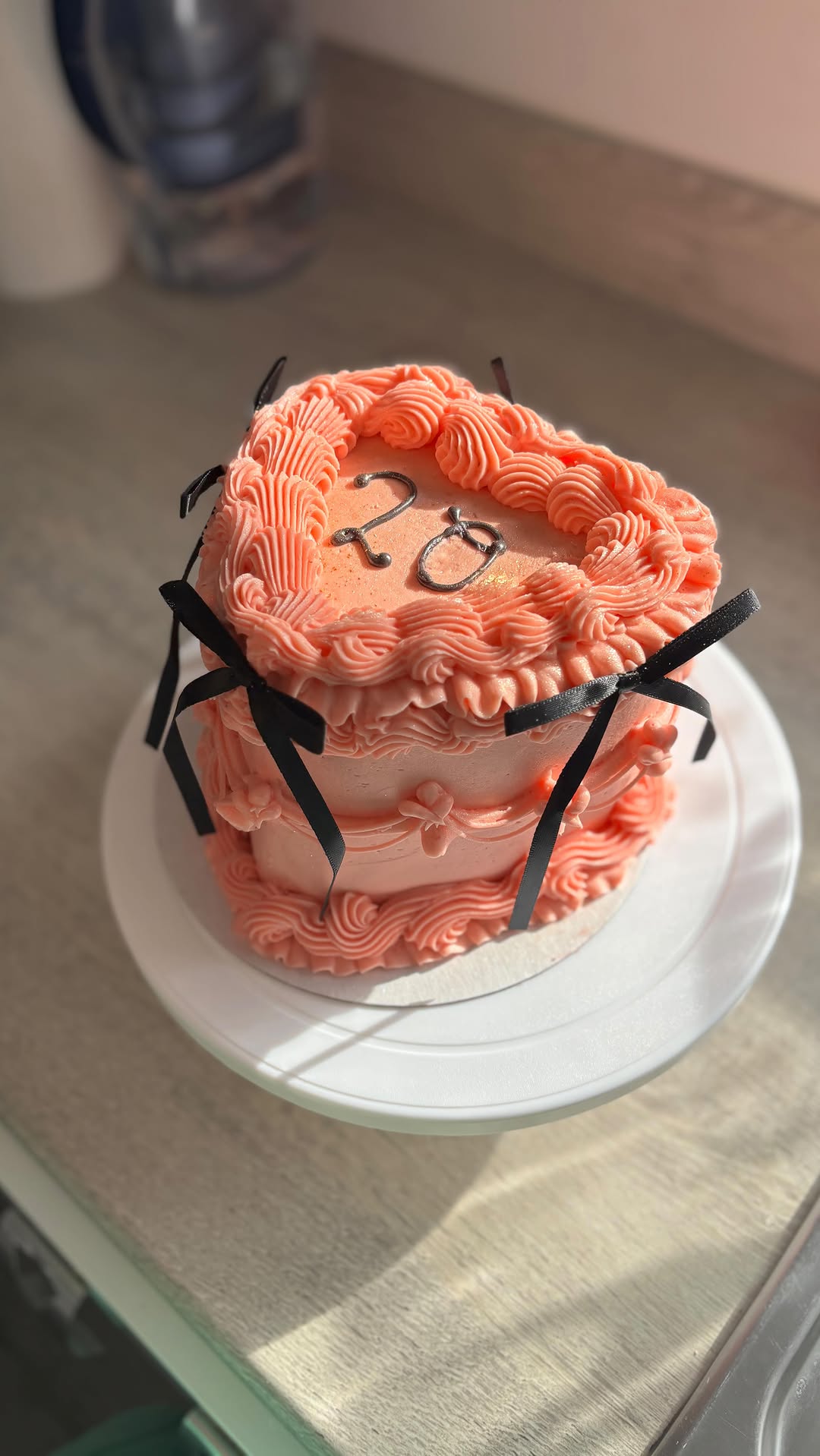 Pink celebration cake with bow detailing by Cakes by Leila