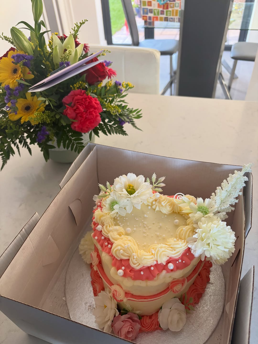Floral heart-shaped birthday cake with piped buttercream by Cakes by Leila